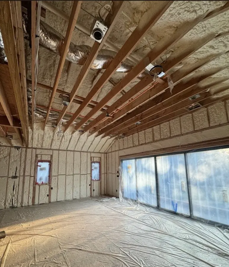 Interior walls and ceiling insulated with spray foam during new construction in Gardner